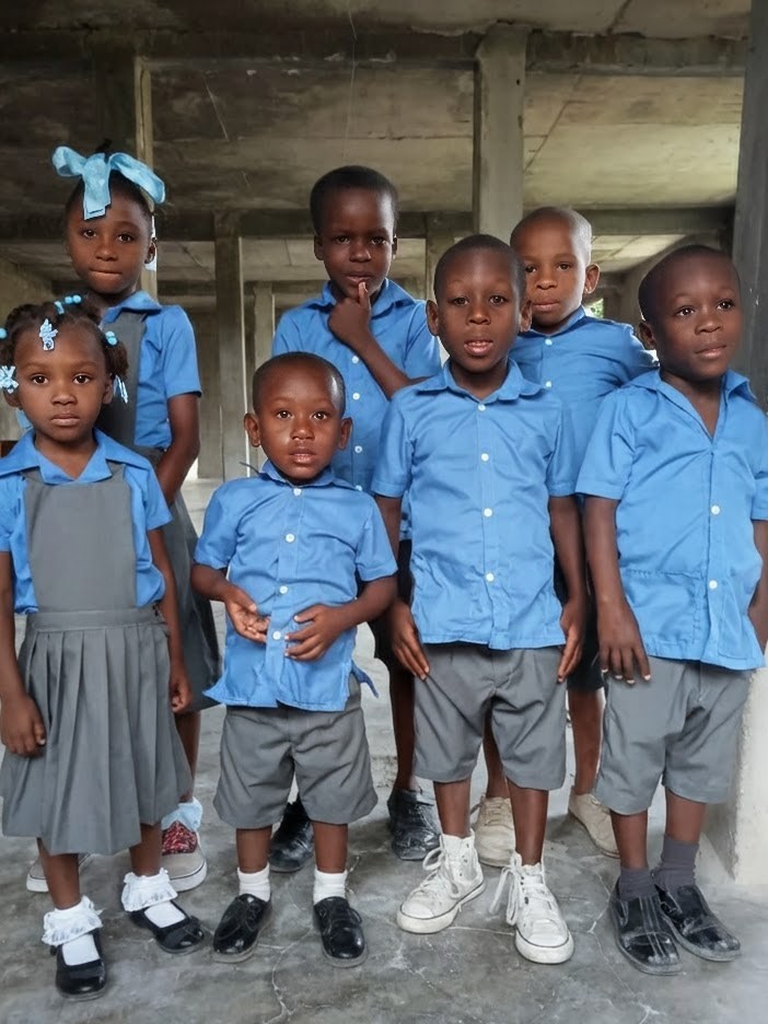 Students in school uniforms at an affiliated Haitian school